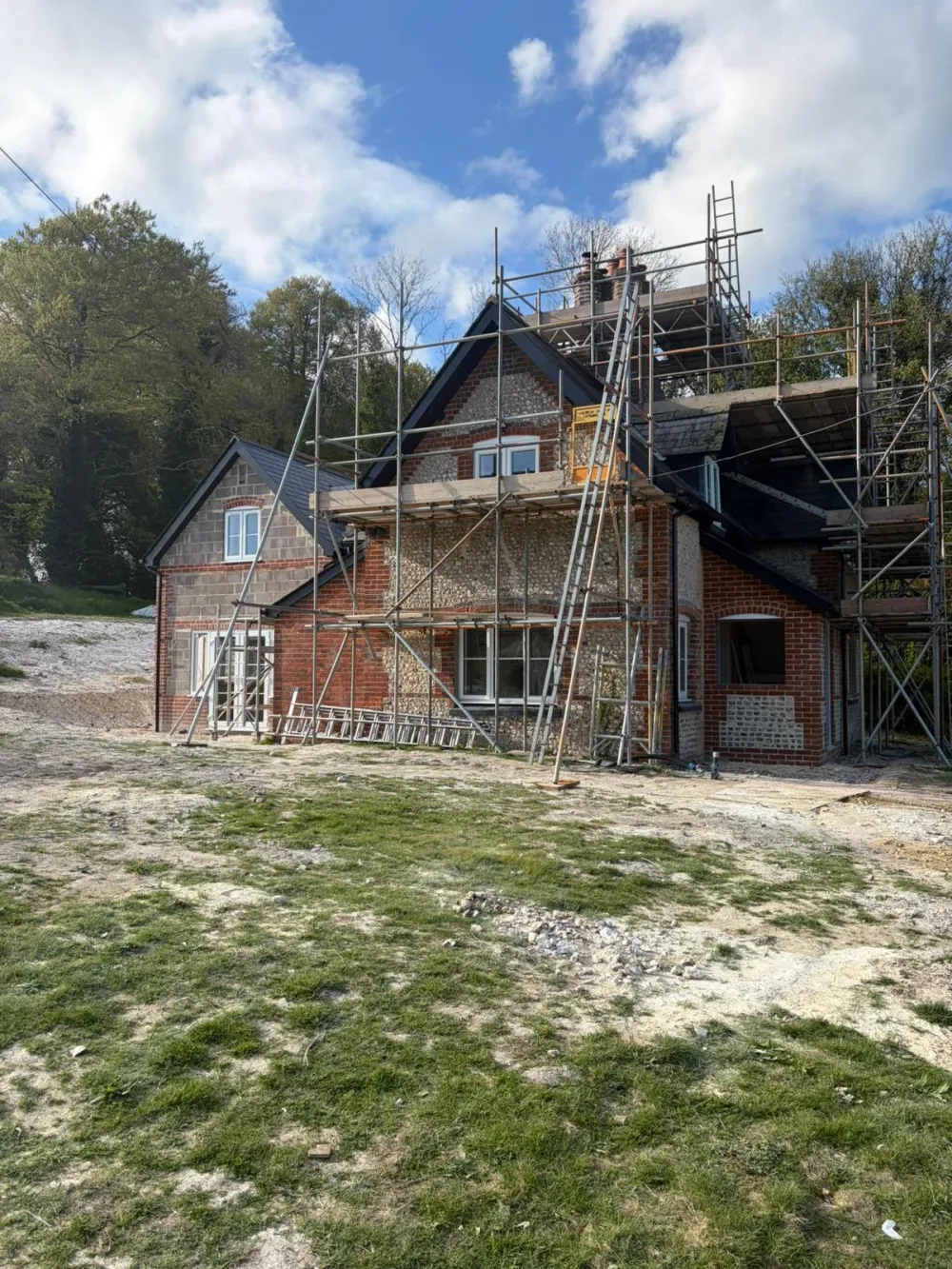 The lodge under scaffolding while the extension is built