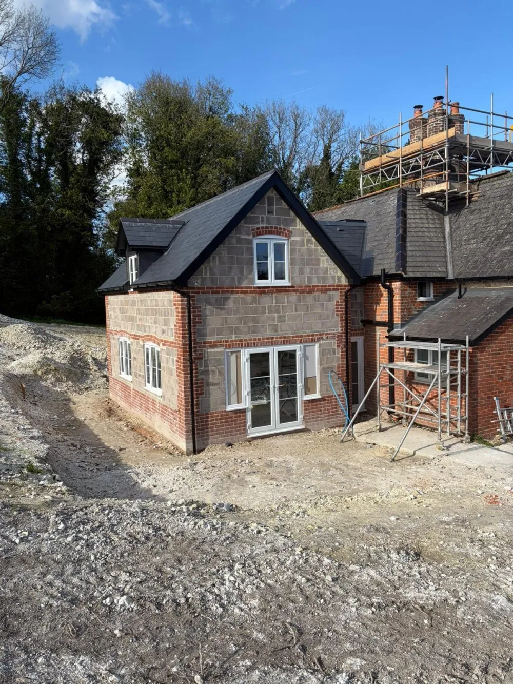The new gable extension in blockwork and brick during construction